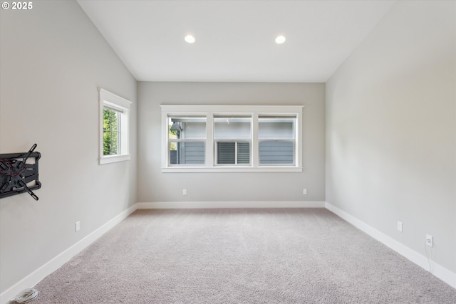 unfurnished room featuring carpet floors, baseboards, and recessed lighting