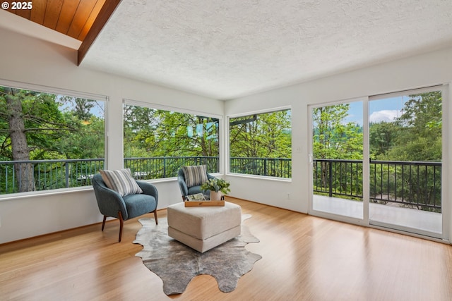 630 SW Viewmont Dr, Portland, OR 97225 - sunroom with wood finished floors and a textured ceiling