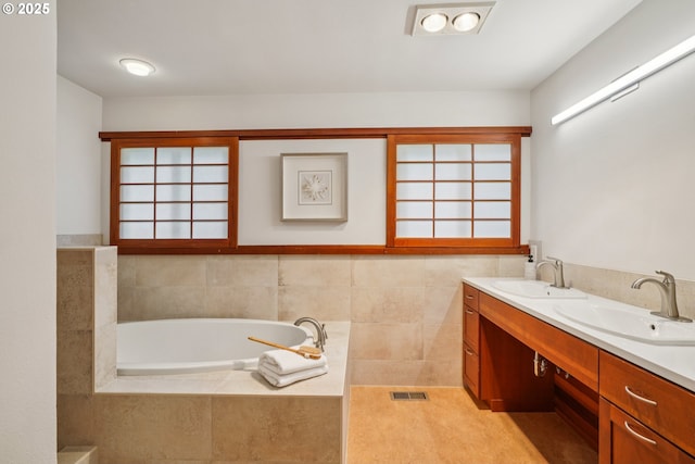 630 SW Viewmont Dr, Portland, OR 97225 - bathroom featuring a garden tub and double vanity