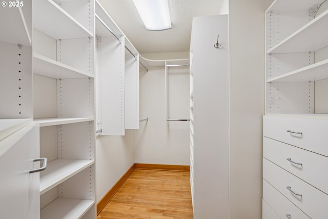 630 SW Viewmont Dr, Portland, OR 97225 - walk in closet featuring light wood-style flooring