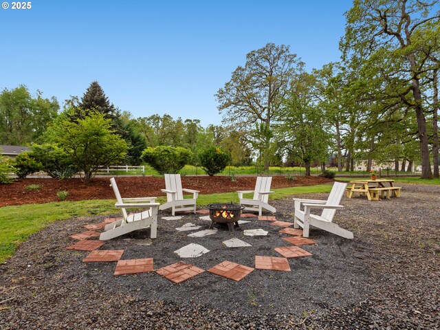 view of patio with a fire pit