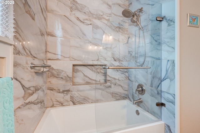 full bathroom featuring bath / shower combo with glass door