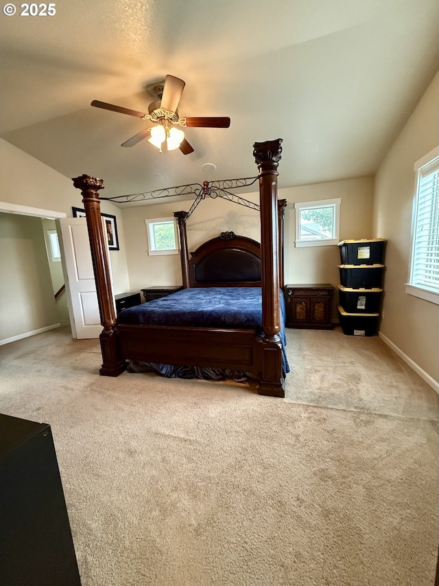 4002 N 3rd Cir, Ridgefield, WA 98642 - carpeted bedroom featuring multiple windows, baseboards, and a ceiling fan