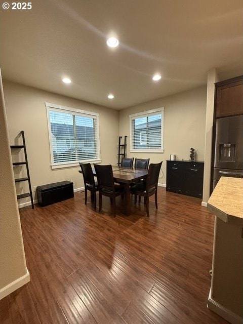 4002 N 3rd Cir, Ridgefield, WA 98642 - dining area featuring dark wood-style flooring, baseboards, and recessed lighting