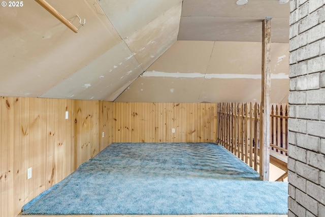 10303 SE Bull Run Rd, Corbett, OR 97019 - bonus room featuring vaulted ceiling, carpet floors, and wooden walls
