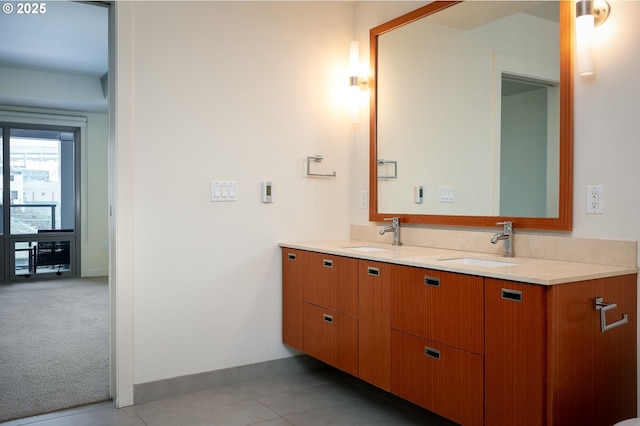 bathroom featuring vanity and tile patterned flooring