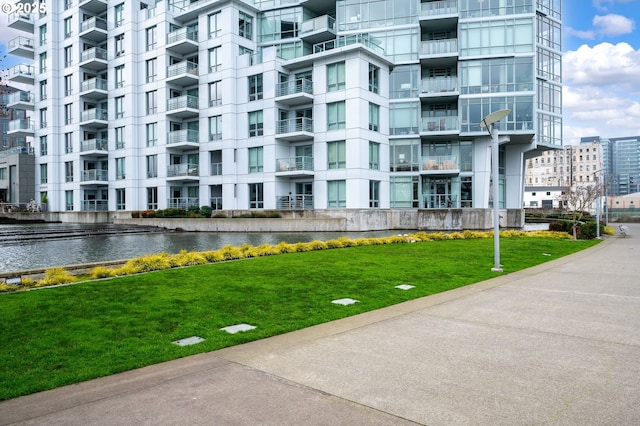 view of property with a water view