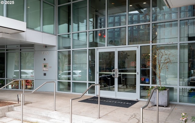 entrance to property featuring french doors