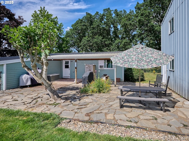4887 S Elliott Prairie Rd, Woodburn, OR 97071 - rear view of property featuring a patio and outdoor dining area