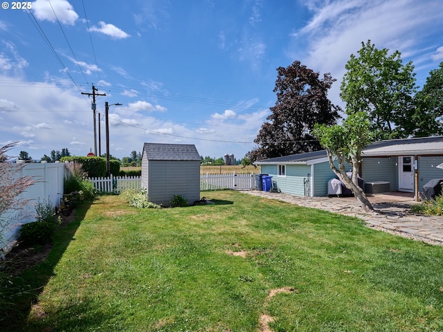 4887 S Elliott Prairie Rd, Woodburn, OR 97071 - fenced backyard featuring a storage shed