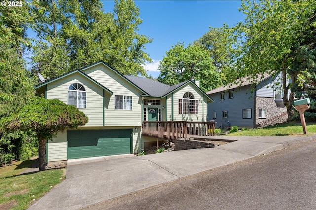 single story home with an attached garage and driveway