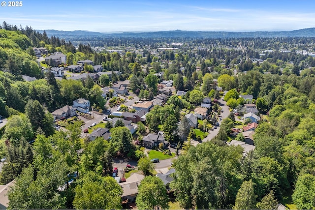 birds eye view of property featuring a residential view and a mountain view