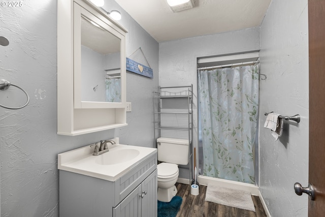1495 N Hemlock St, Coquille, OR 97423 - bathroom featuring wood finished floors, vanity, and a shower with curtain