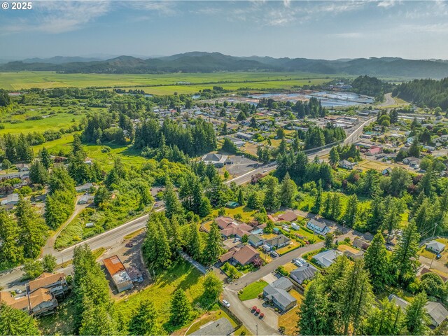 1495 N Hemlock St, Coquille, OR 97423 - view of property location with a mountain backdrop and nearby suburban area