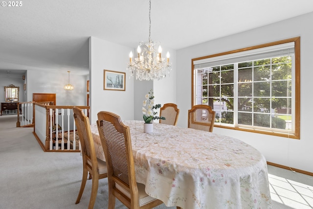 8346 SE 141st Ave, Portland, OR 97236 - carpeted dining area with a chandelier and baseboards