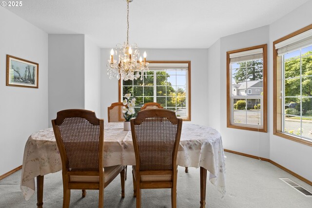 8346 SE 141st Ave, Portland, OR 97236 - dining room with light colored carpet and a chandelier