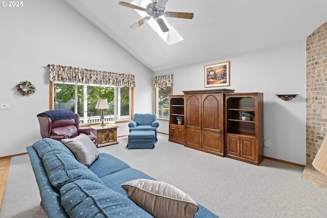 8346 SE 141st Ave, Portland, OR 97236 - living area featuring ceiling fan, high vaulted ceiling, a skylight, and carpet flooring