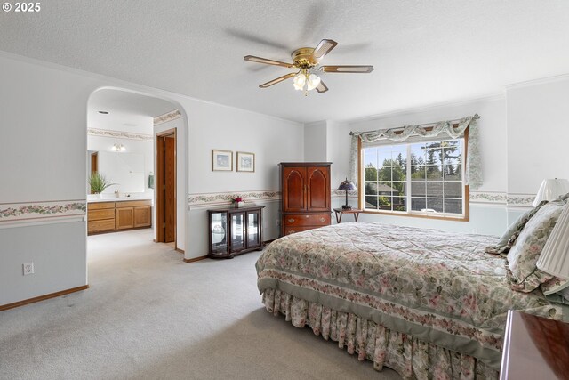 8346 SE 141st Ave, Portland, OR 97236 - bedroom with arched walkways, light colored carpet, ornamental molding, a textured ceiling, and ceiling fan