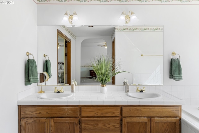 8346 SE 141st Ave, Portland, OR 97236 - full bath with double vanity, a tub, and a ceiling fan
