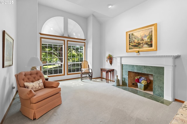 8346 SE 141st Ave, Portland, OR 97236 - living area featuring carpet, vaulted ceiling, recessed lighting, and a tile fireplace