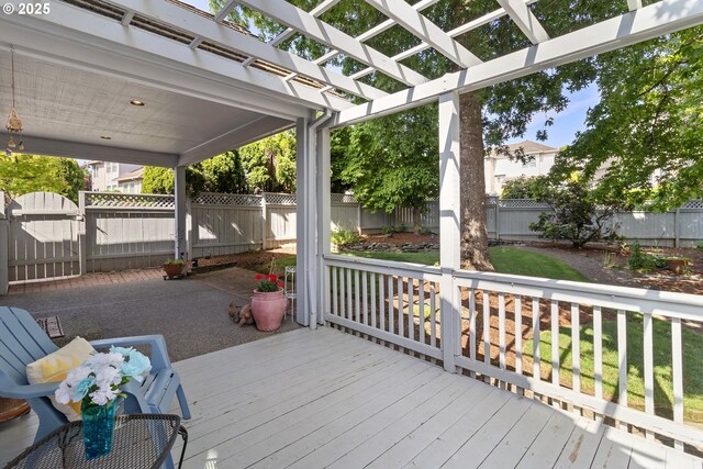 8346 SE 141st Ave, Portland, OR 97236 - wooden deck with a fenced backyard and a pergola