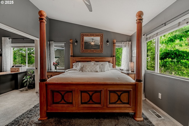 carpeted bedroom featuring lofted ceiling and ceiling fan