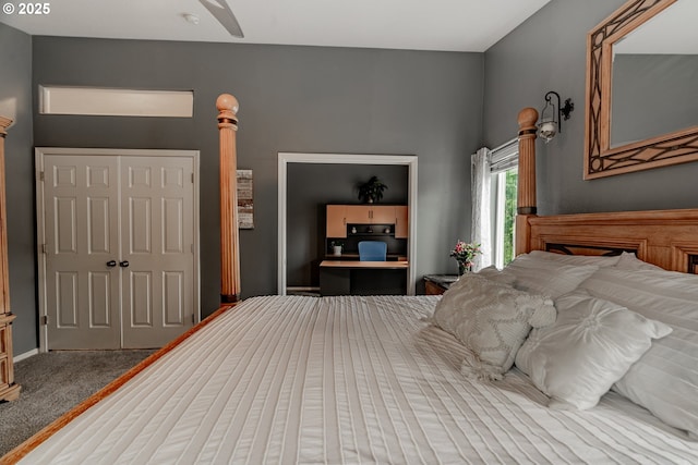 carpeted bedroom featuring a closet and a ceiling fan