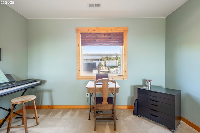 living area featuring visible vents, carpet, and baseboards