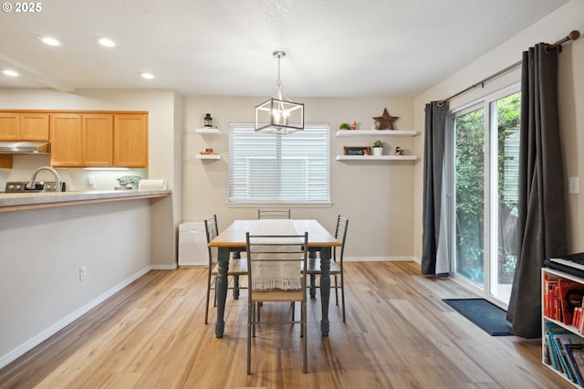 8028 SW Carol Ann Ct, Portland, OR 97224 - dining room with recessed lighting, light wood-style floors, and baseboards