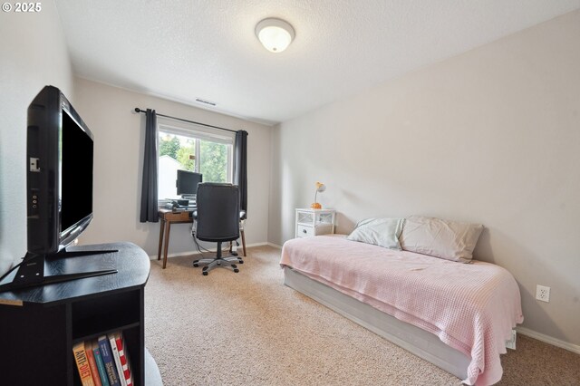 8028 SW Carol Ann Ct, Portland, OR 97224 - carpeted bedroom featuring baseboards