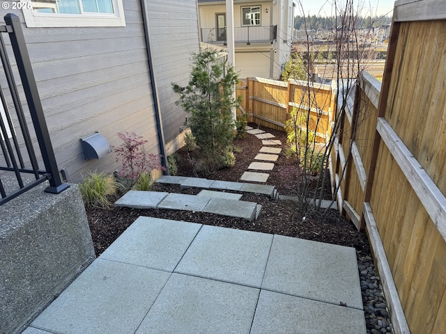 view of yard with a patio area and fence