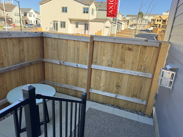 view of patio with a residential view