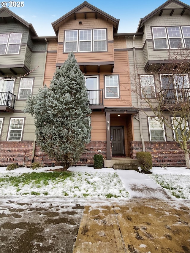 multi unit property featuring brick siding