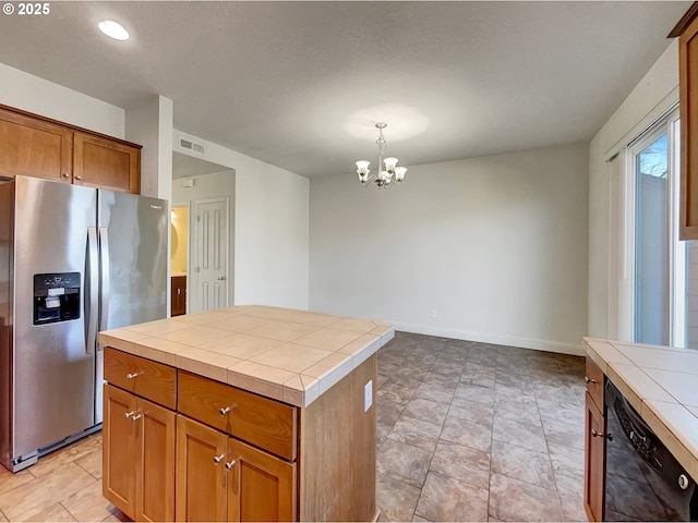 kitchen featuring visible vents, tile counters, black dishwasher, stainless steel refrigerator with ice dispenser, and brown cabinetry