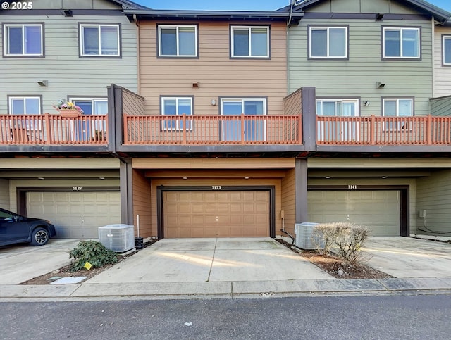 view of front facade with central AC unit and driveway