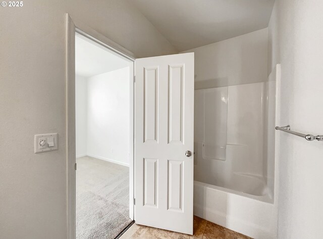 bathroom featuring bathing tub / shower combination