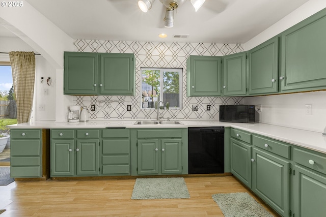 255 W F St, Halsey, OR 97348 - kitchen featuring black appliances, a sink, arched walkways, decorative backsplash, and light countertops