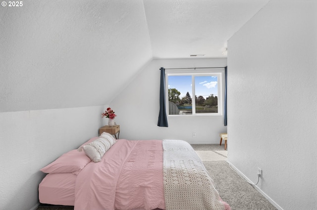255 W F St, Halsey, OR 97348 - bedroom featuring vaulted ceiling, carpet floors, a textured ceiling, and baseboards