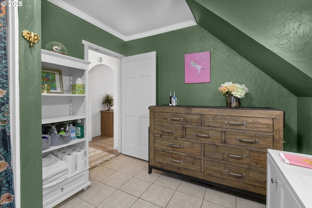 255 W F St, Halsey, OR 97348 - bedroom featuring a textured wall, light tile patterned floors, crown molding, and arched walkways