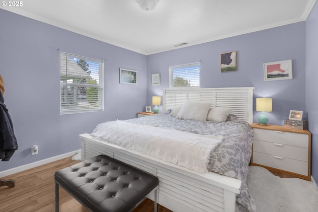 255 W F St, Halsey, OR 97348 - bedroom with baseboards, ornamental molding, and light wood-style floors