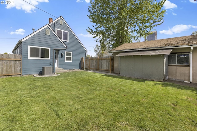 255 W F St, Halsey, OR 97348 - back of property with a chimney and central AC