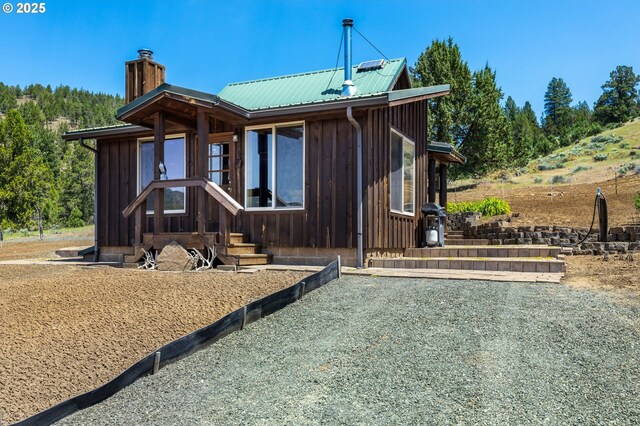0 Hwy 395, Mount Vernon, OR 97865 - rear view of house with a chimney and a metal roof