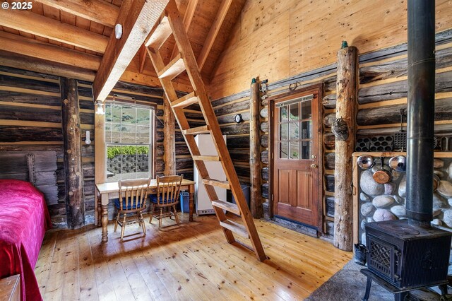 0 Hwy 395, Mount Vernon, OR 97865 - bedroom with hardwood / wood-style flooring, a wood stove, and log walls