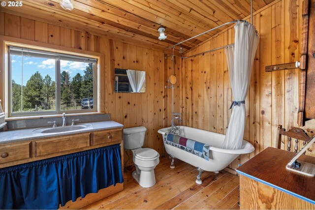 0 Hwy 395, Mount Vernon, OR 97865 - bathroom with a freestanding bath, hardwood / wood-style flooring, wooden ceiling, a shower with shower curtain, and wooden walls