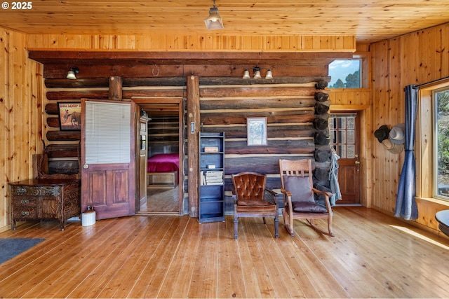 0 Hwy 395, Mount Vernon, OR 97865 - living area featuring hardwood / wood-style floors, wood ceiling, and log walls