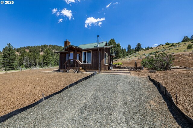 0 Hwy 395, Mount Vernon, OR 97865 - view of front of property featuring a chimney and a metal roof
