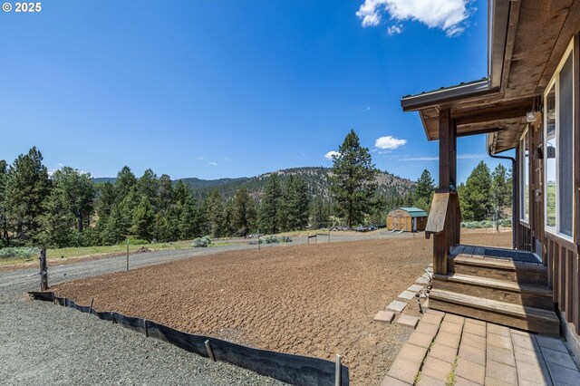 0 Hwy 395, Mount Vernon, OR 97865 - view of yard with a mountain view, a view of trees, and a storage shed