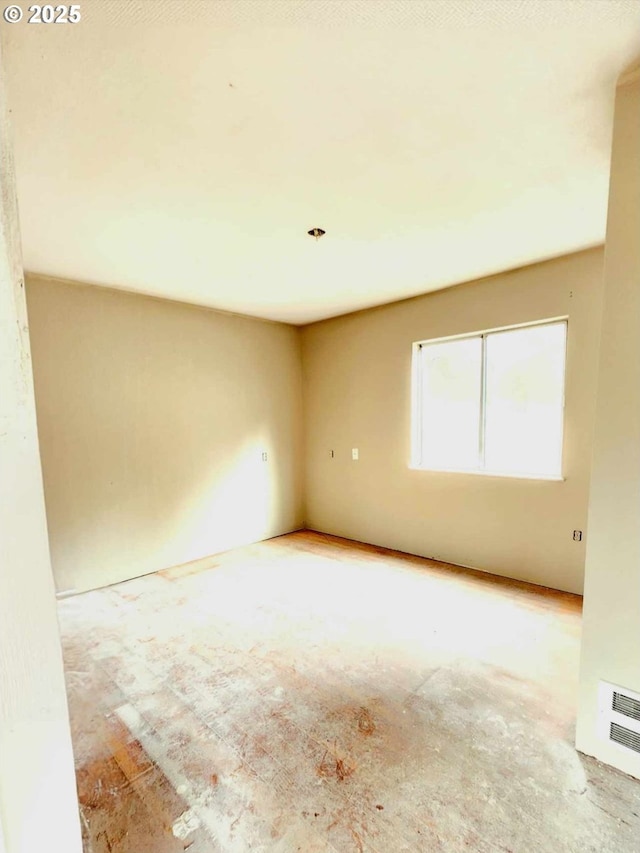 empty room featuring visible vents