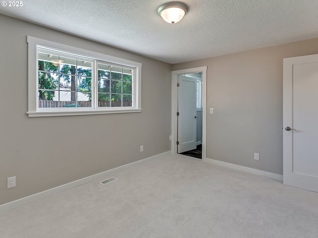 907 NW 90th St, Vancouver, WA 98665 - unfurnished bedroom with a textured ceiling and carpet