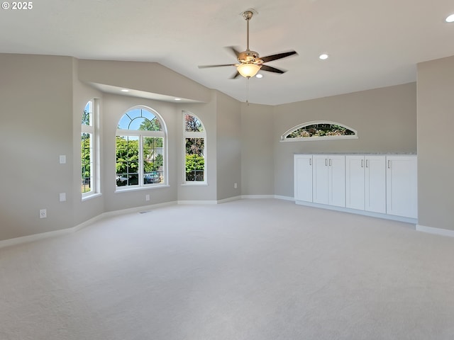 907 NW 90th St, Vancouver, WA 98665 - empty room featuring light colored carpet, a ceiling fan, vaulted ceiling, and recessed lighting